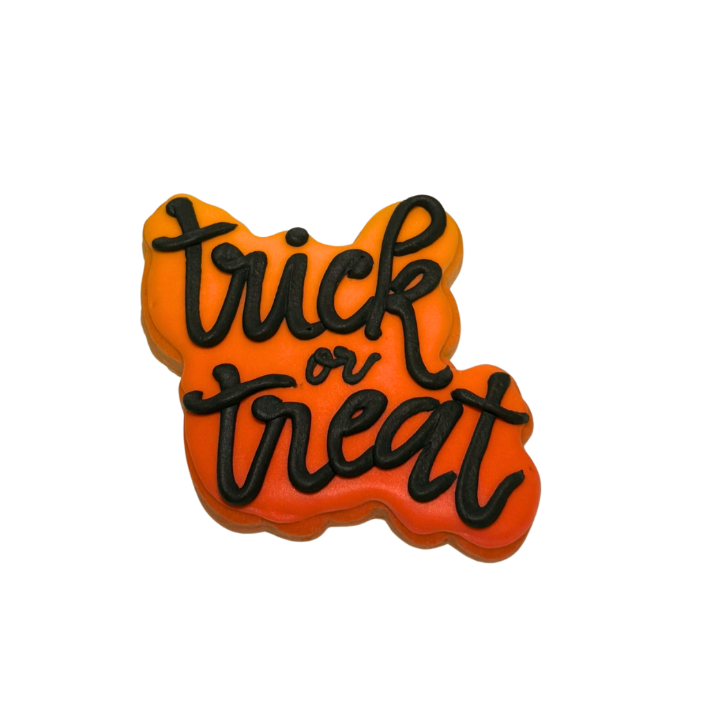 Halloween cookie with orange icing and black script text.