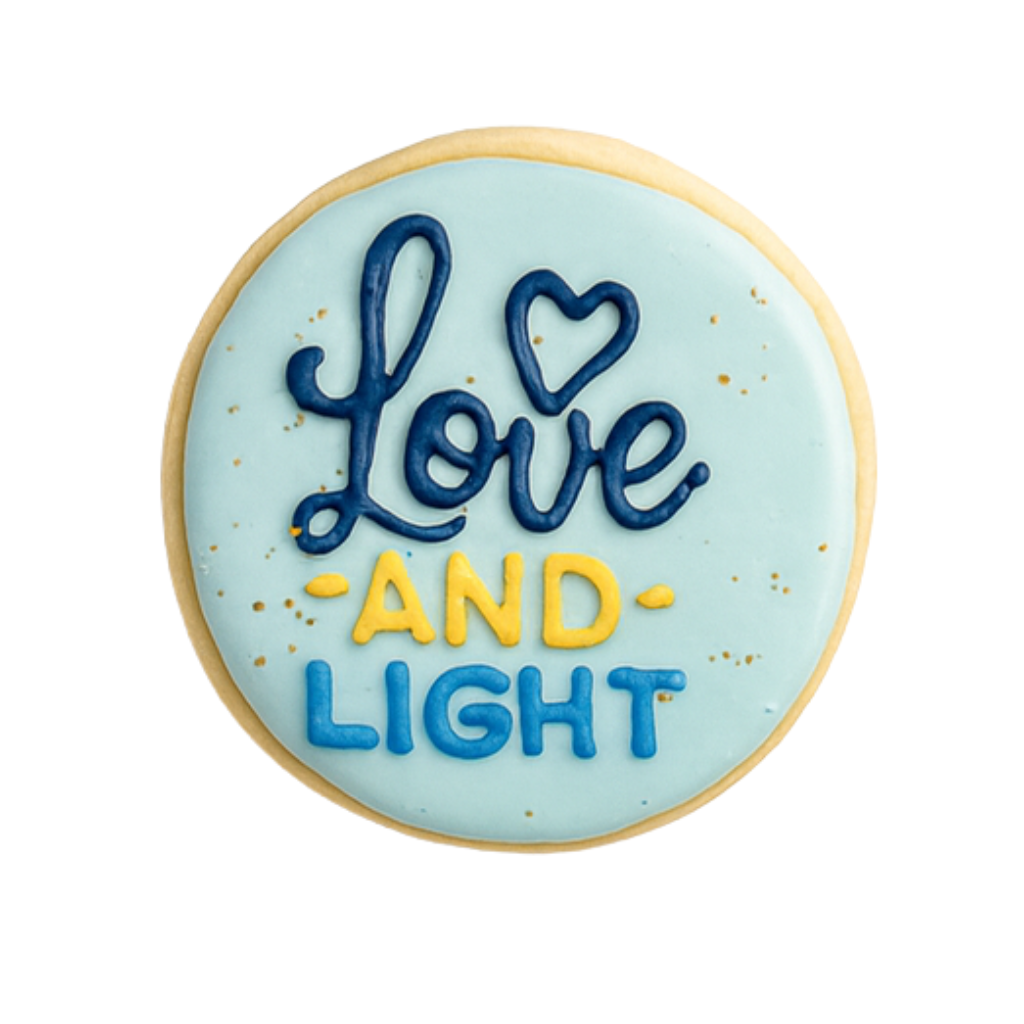 Hanukkah cookie with blue icing and Love and Light text.