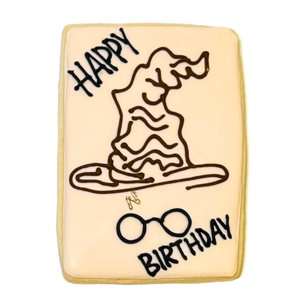 Harry Potter birthday cookie with Sorting Hat and glasses.