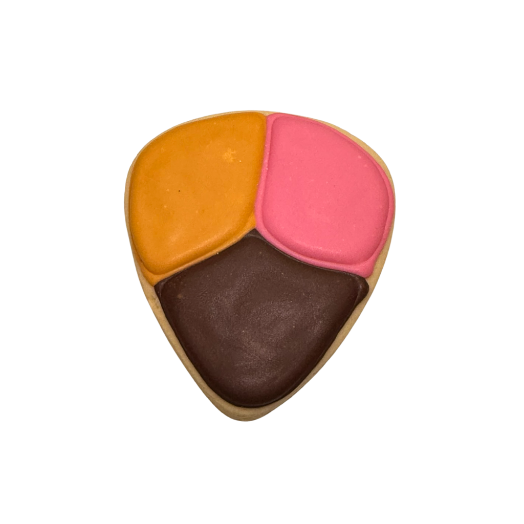 Hispanic Heritage cookie with orange, pink, and brown icing.