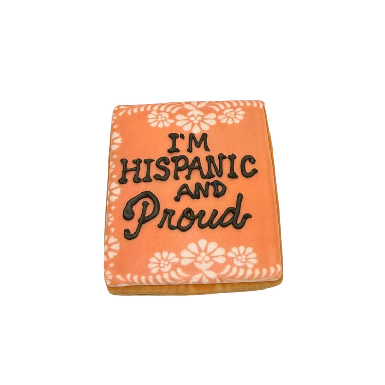 Hispanic Heritage cookie with orange icing and floral border.