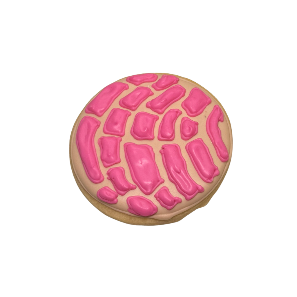 Hispanic Heritage cookie with pink shell-patterned icing