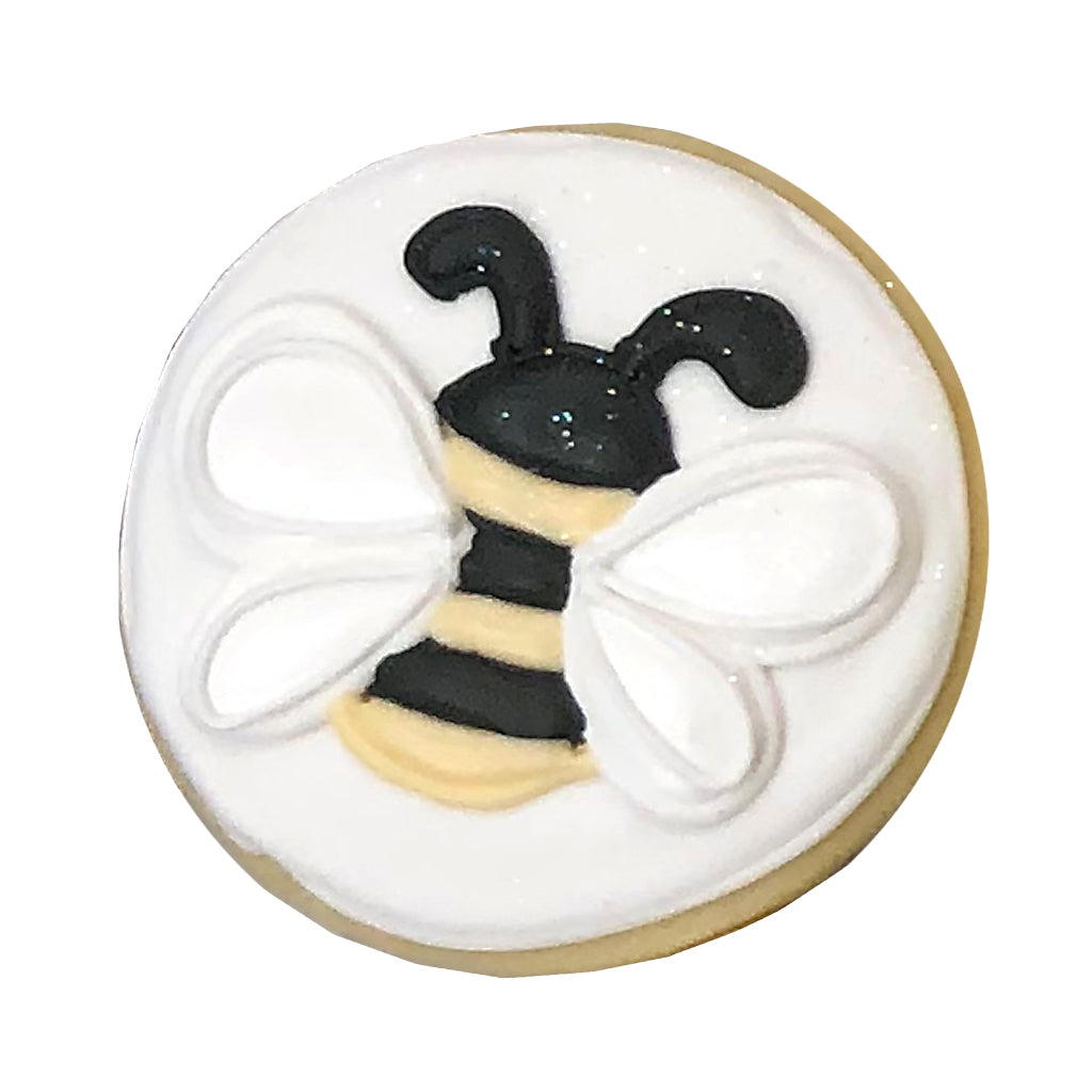 Winnie Honeybee round cookie with white icing design