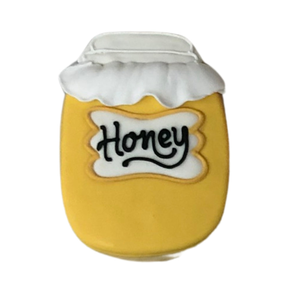 Jewish High Holidays honey jar cookie with white icing