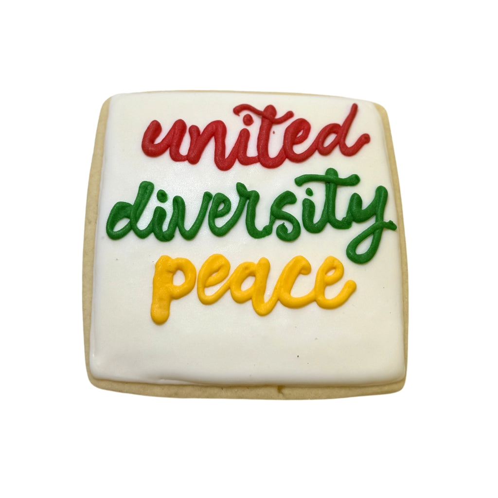 Juneteenth square cookie with red, green, and yellow icing.