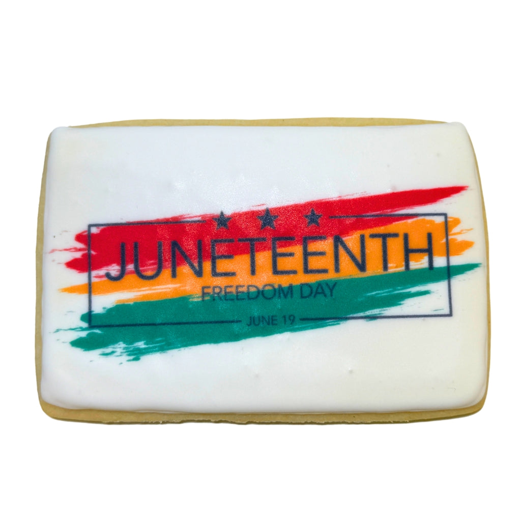 Rectangular Juneteenth cookie with red, yellow, and green art.