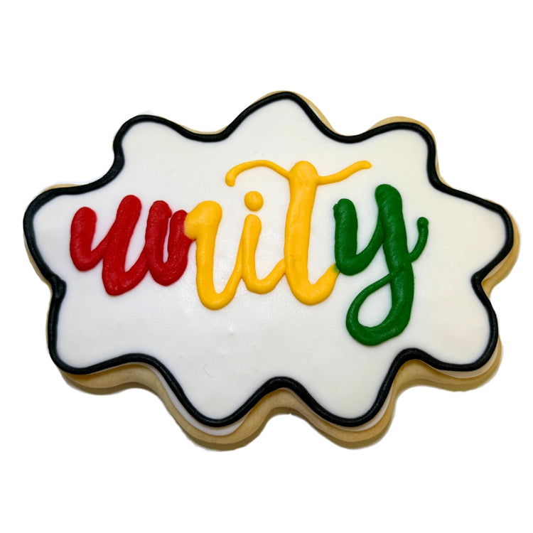 Juneteenth cookie shaped like a cloud with Unity in icing.
