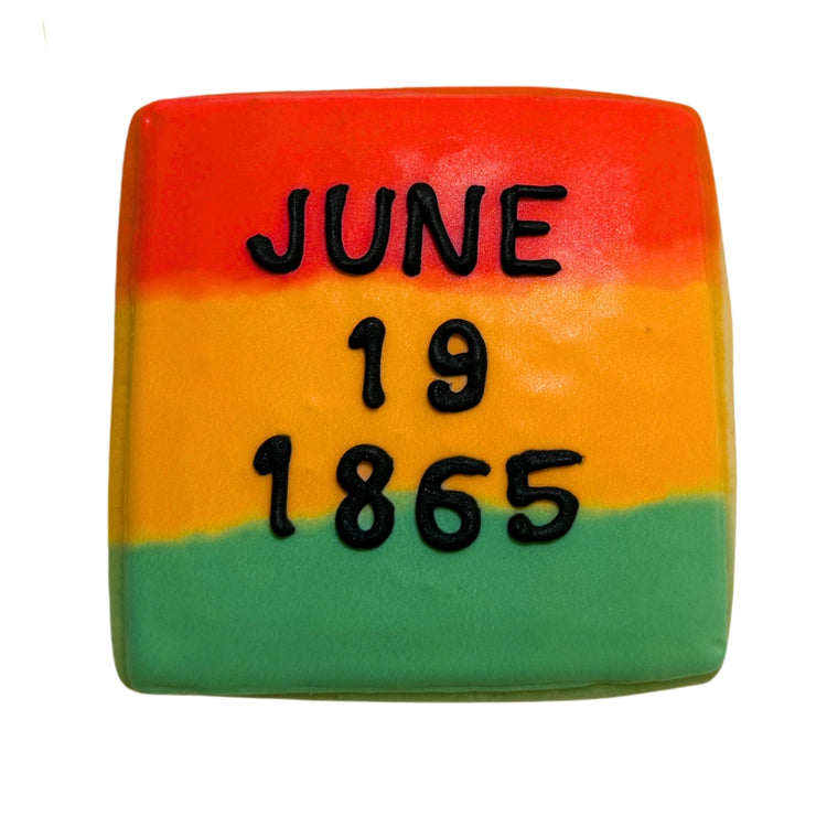 Juneteenth cookie with red, yellow, and green icing.