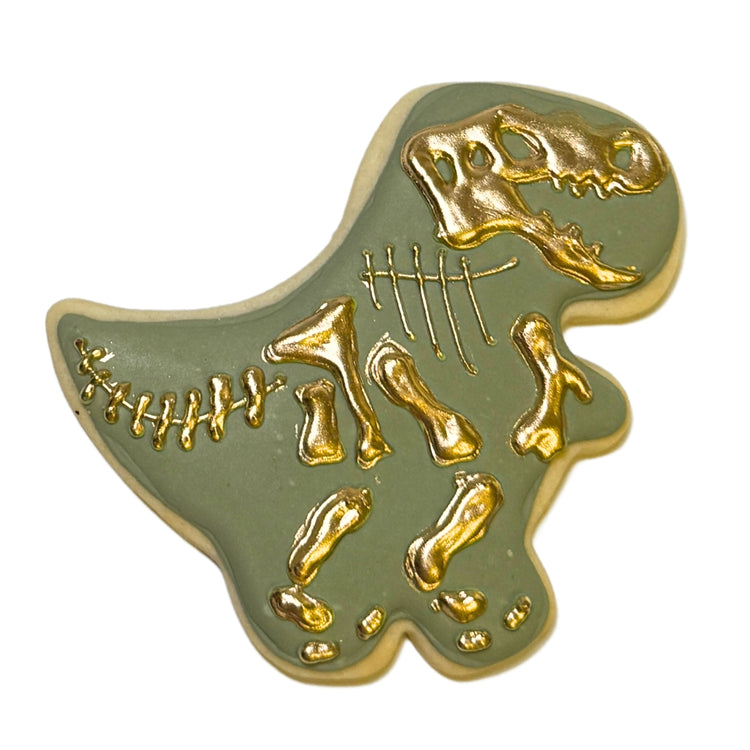 Jurassic Cookies dinosaur shaped with gold skeleton icing