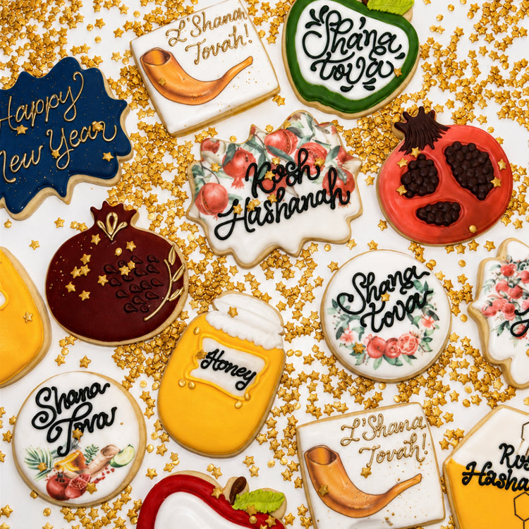 Assorted Jewish High Holidays cookies with festive icing designs.
