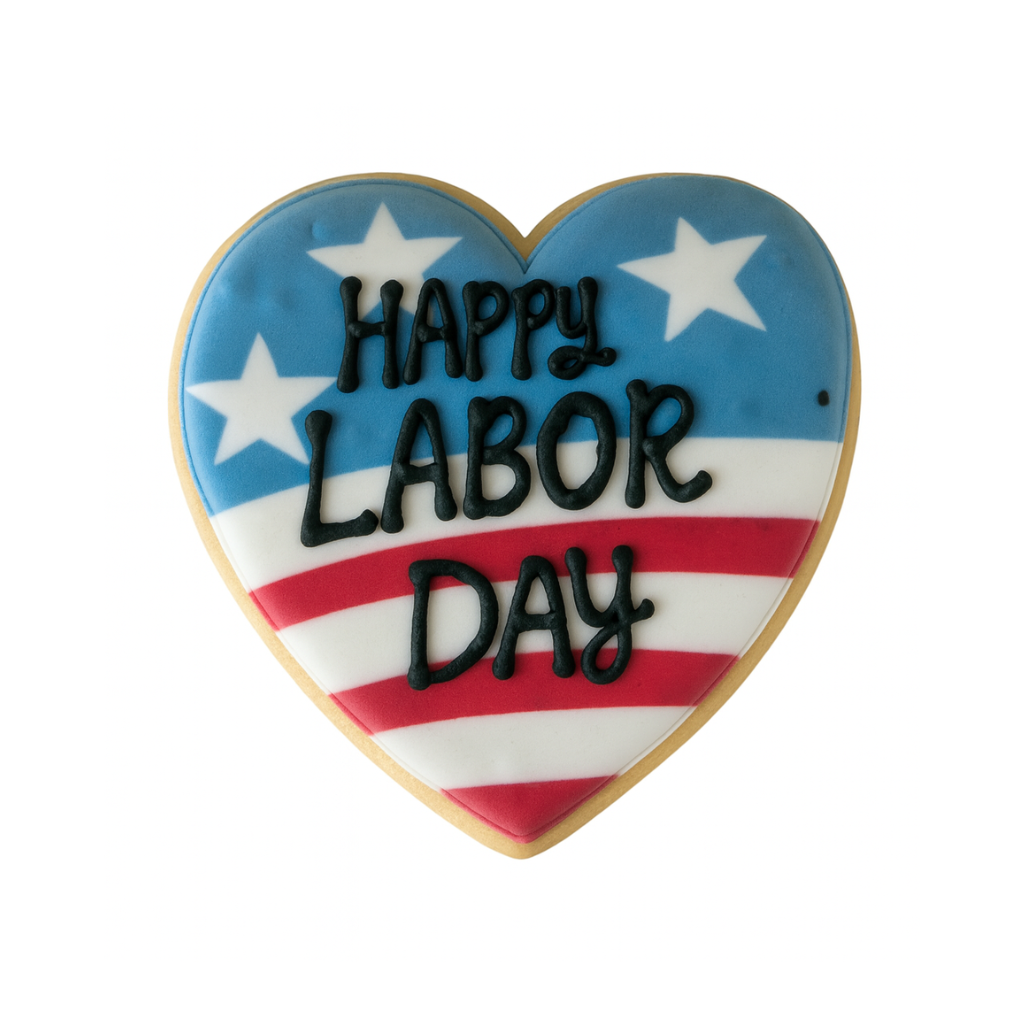 Heart-shaped Labor Day cookie with red, white, and blue icing.