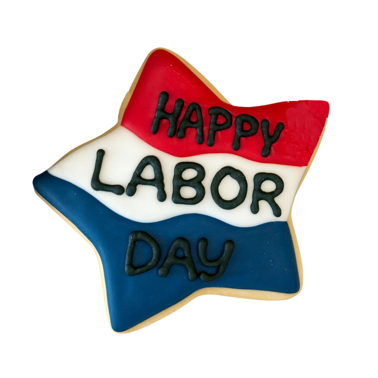Star-shaped Labor Day cookie with red, white, and blue icing.