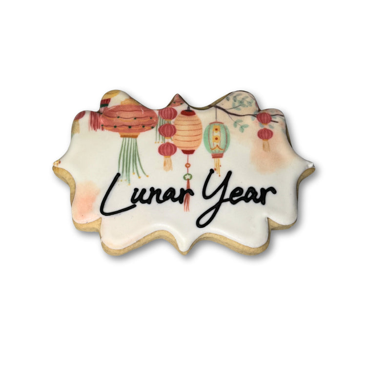Lunar New Year cookie with lantern print and black lettering