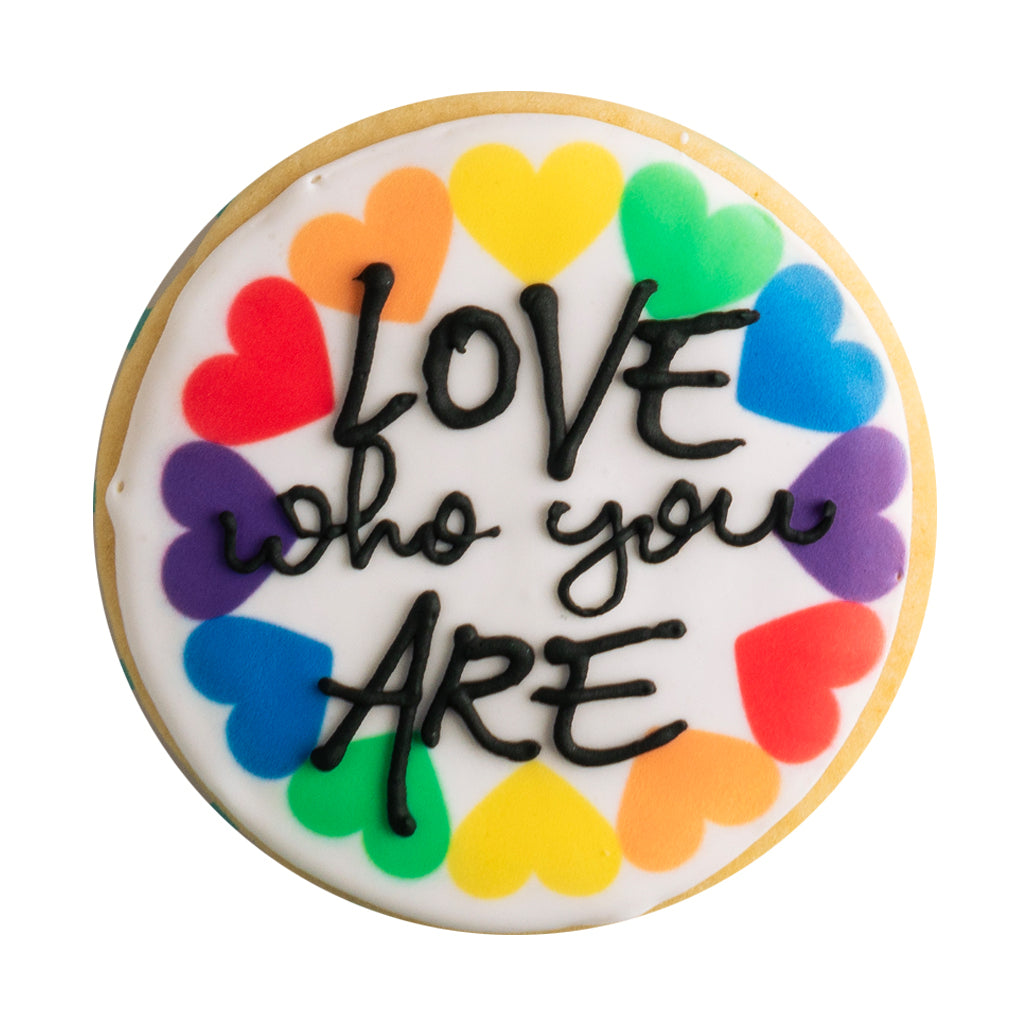 Rainbow message cookie with colorful hearts and black text.