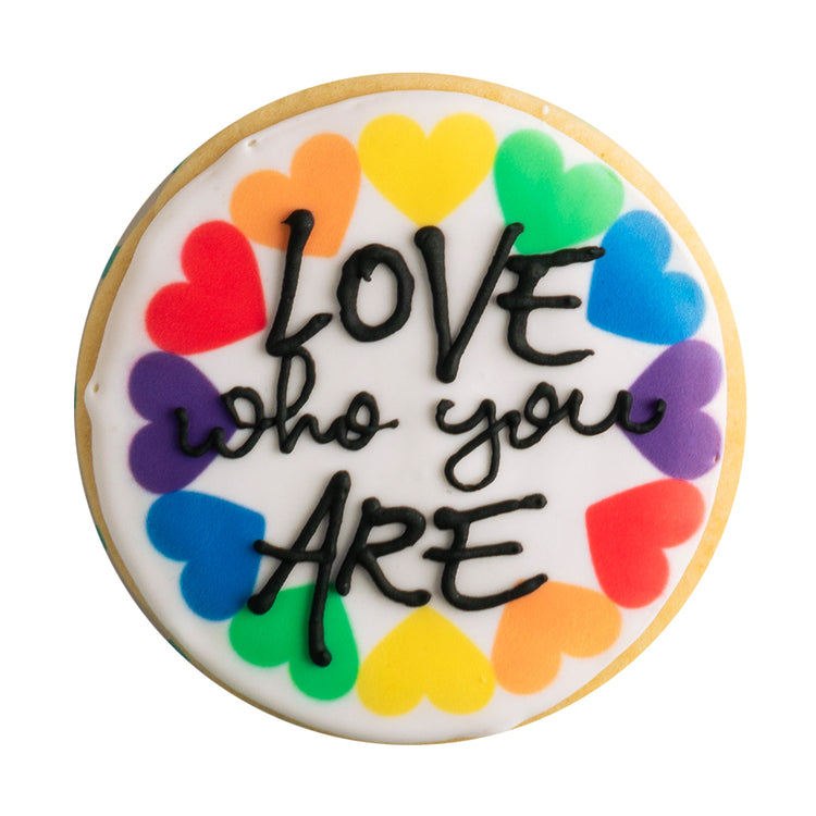 Rainbow message cookie with colorful hearts and black text.