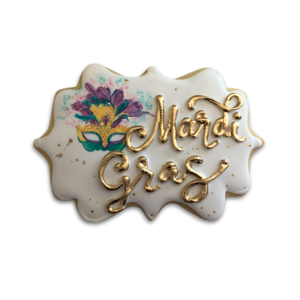Mardi Gras butter cookie with gold icing and mask design.