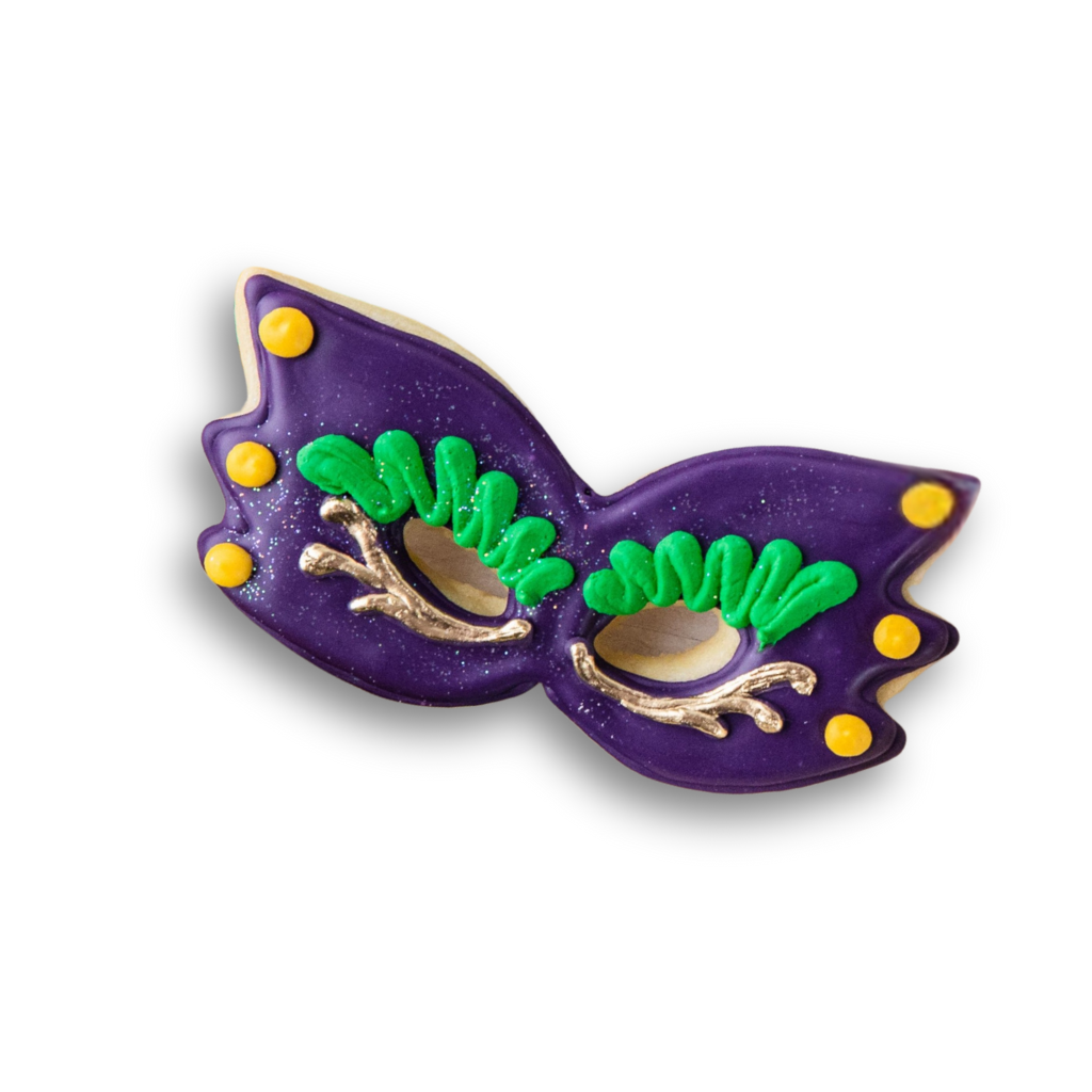 Mardi Gras butter cookie shaped like a purple masquerade mask.