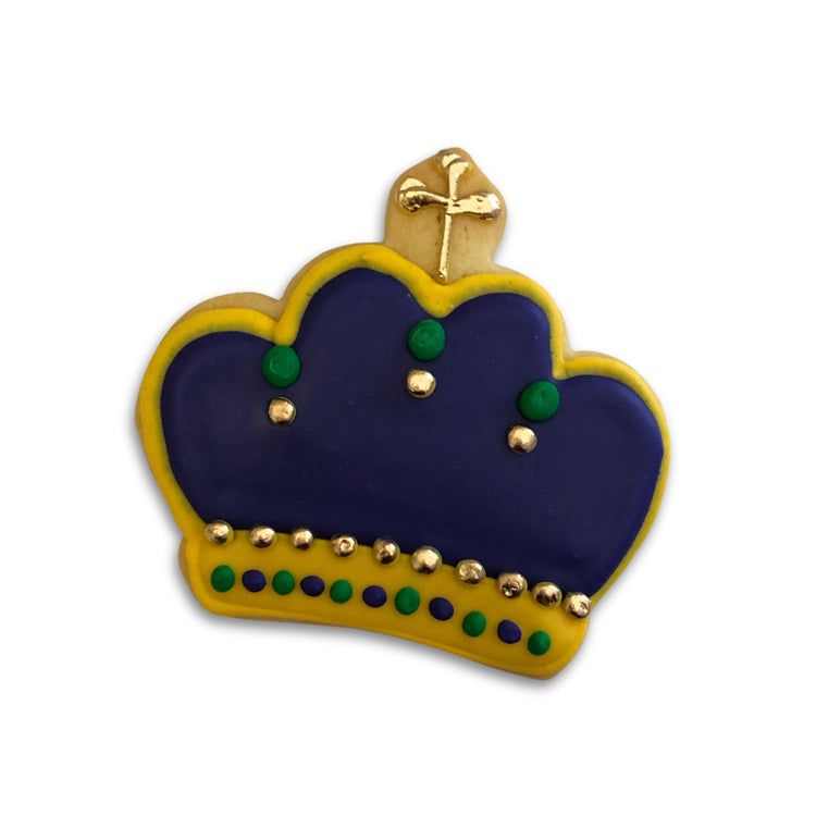 Mardi Gras crown-shaped butter cookie with green, purple, and gold icing detail.