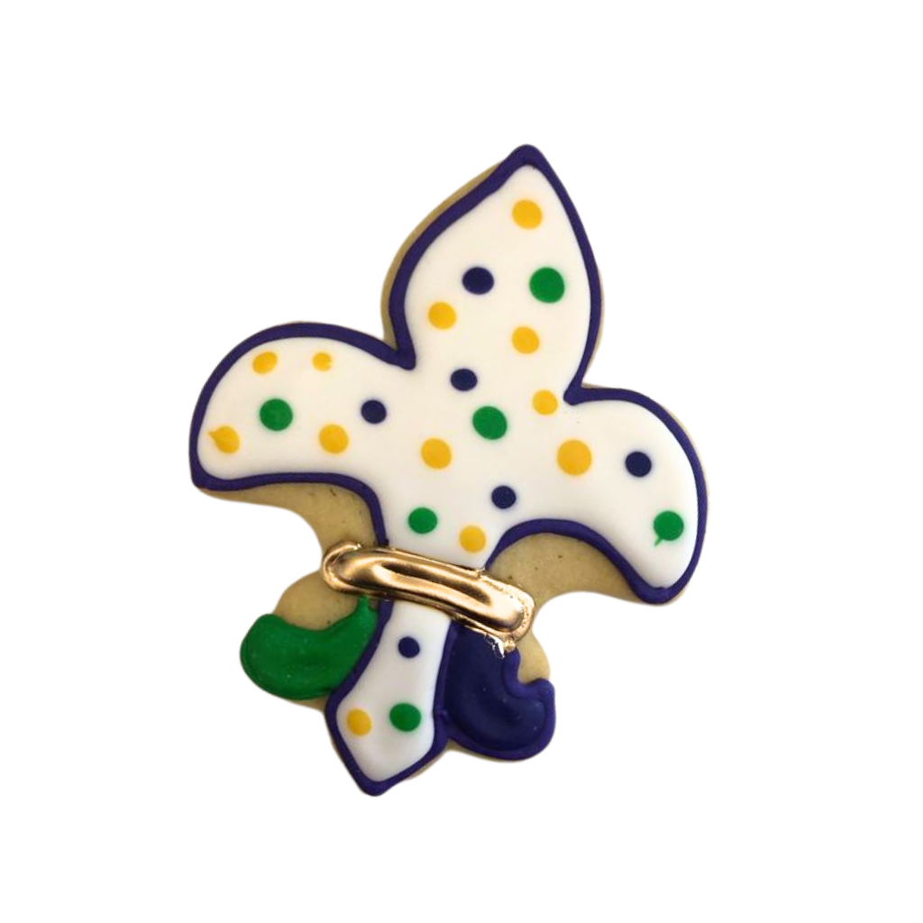 Mardi Gras butter cookie shaped like a fleur-de-lis.