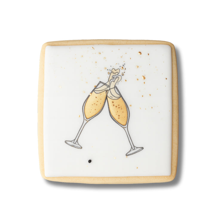 Square New Year cookie with gold champagne flute illustration