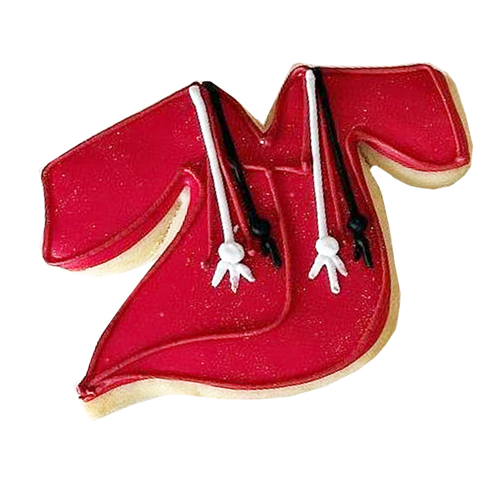 Red graduation gown cookie with white and black icing details.
