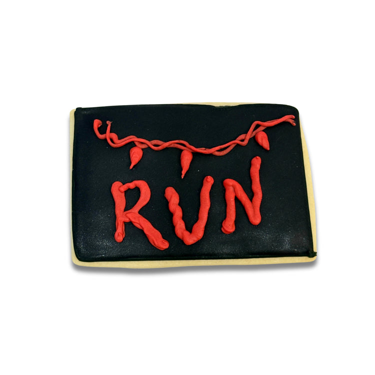 Stranger Cookies with red RUN text and lights on black icing