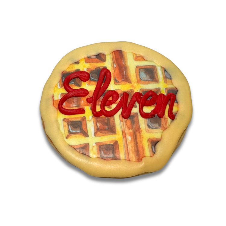 Stranger Cookie shaped like a waffle with Eleven in red icing