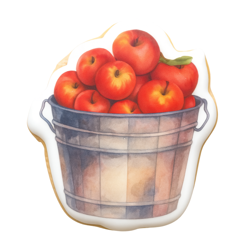 Thanksgiving cookie shaped like a bucket of red apples
