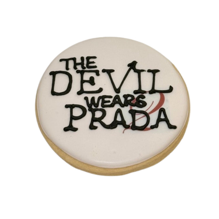Round sugar cookie with The Devil Wears Prada icing.