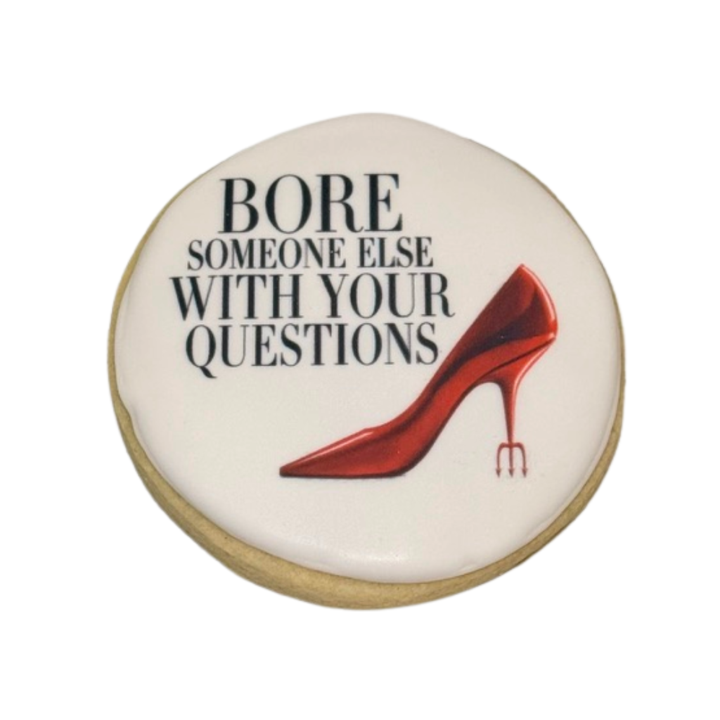 The Devil Eats Cookies with red high heel pitchfork design.