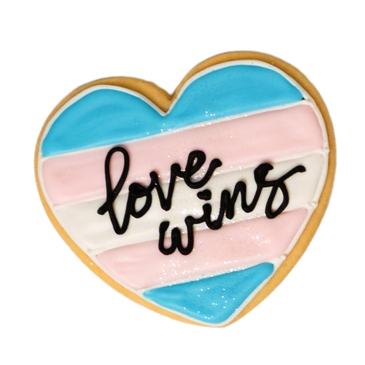Trans Day of Visibility heart cookie with love wins text.
