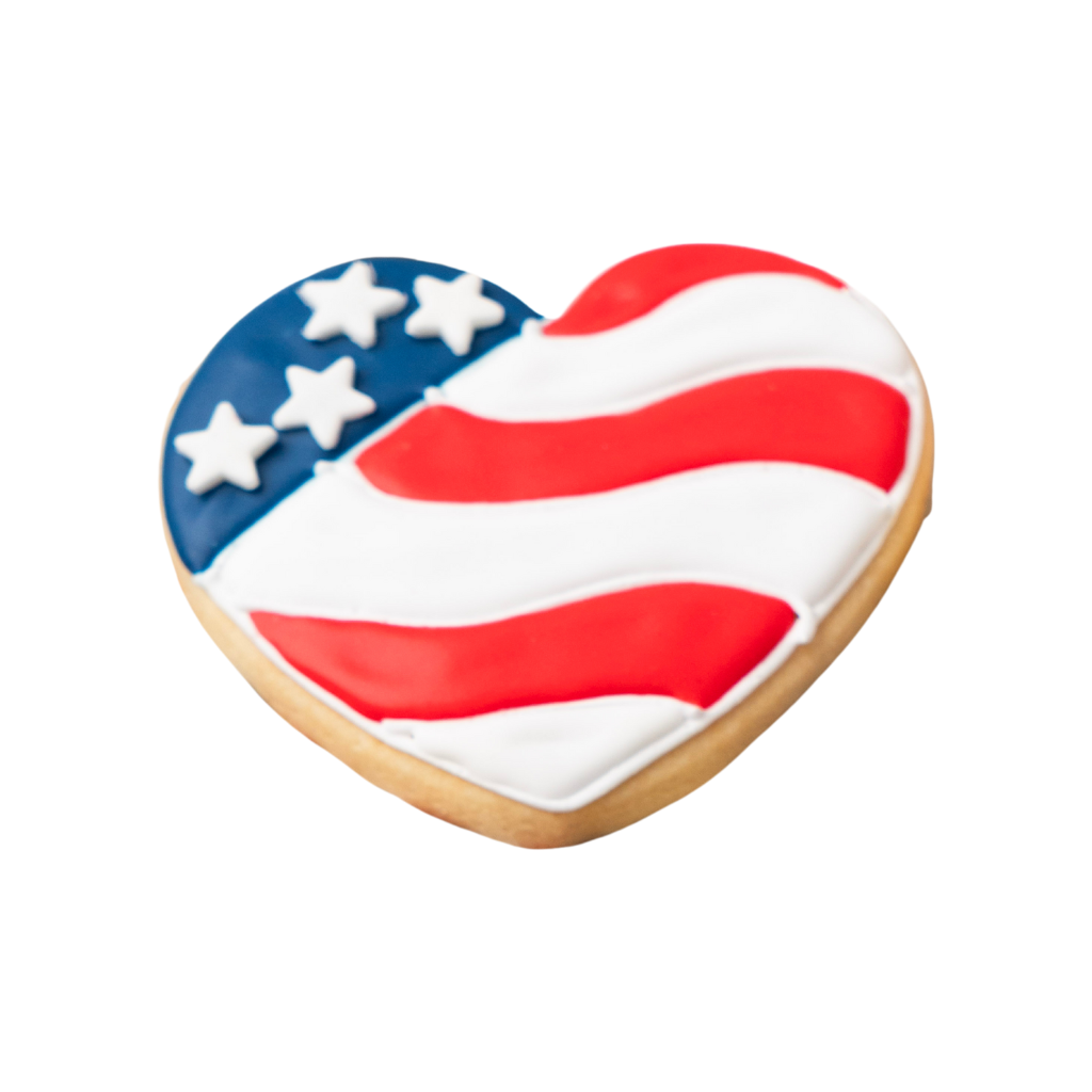 Heart-shaped Veterans Day cookie with American flag icing.