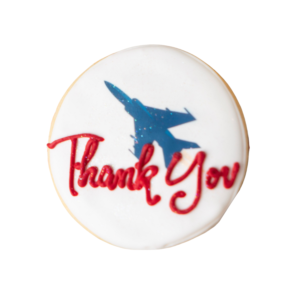Veterans Day cookie with blue jet and red Thank You icing