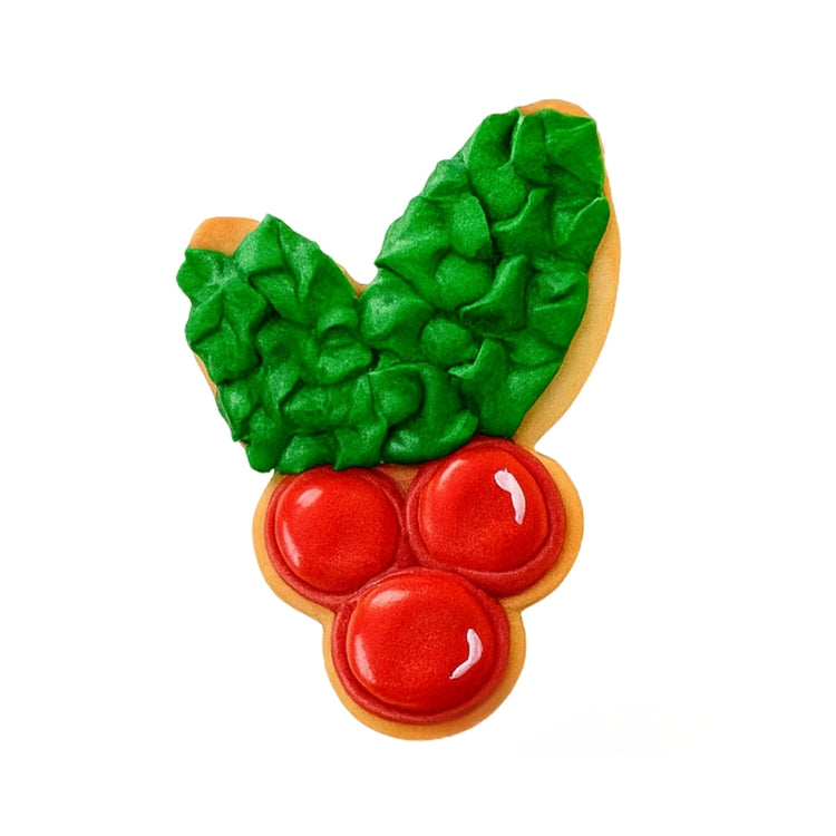 Christmas character cookie shaped like holly berries and leaves.