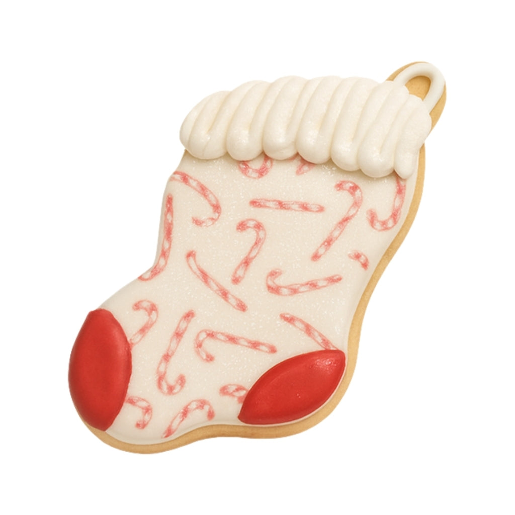 Christmas Couture stocking cookie with candy cane pattern