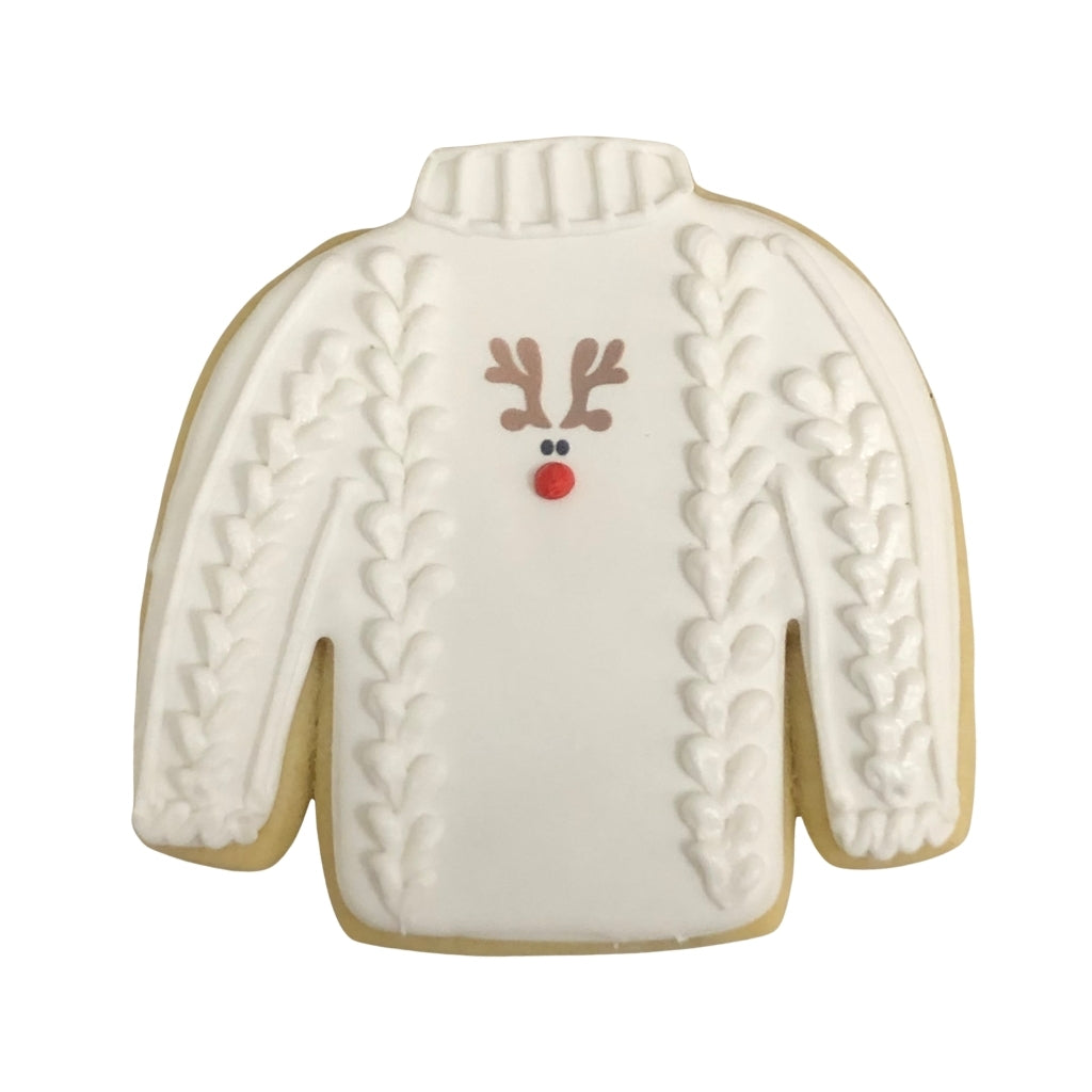 Christmas Couture sweater cookie with reindeer icing.