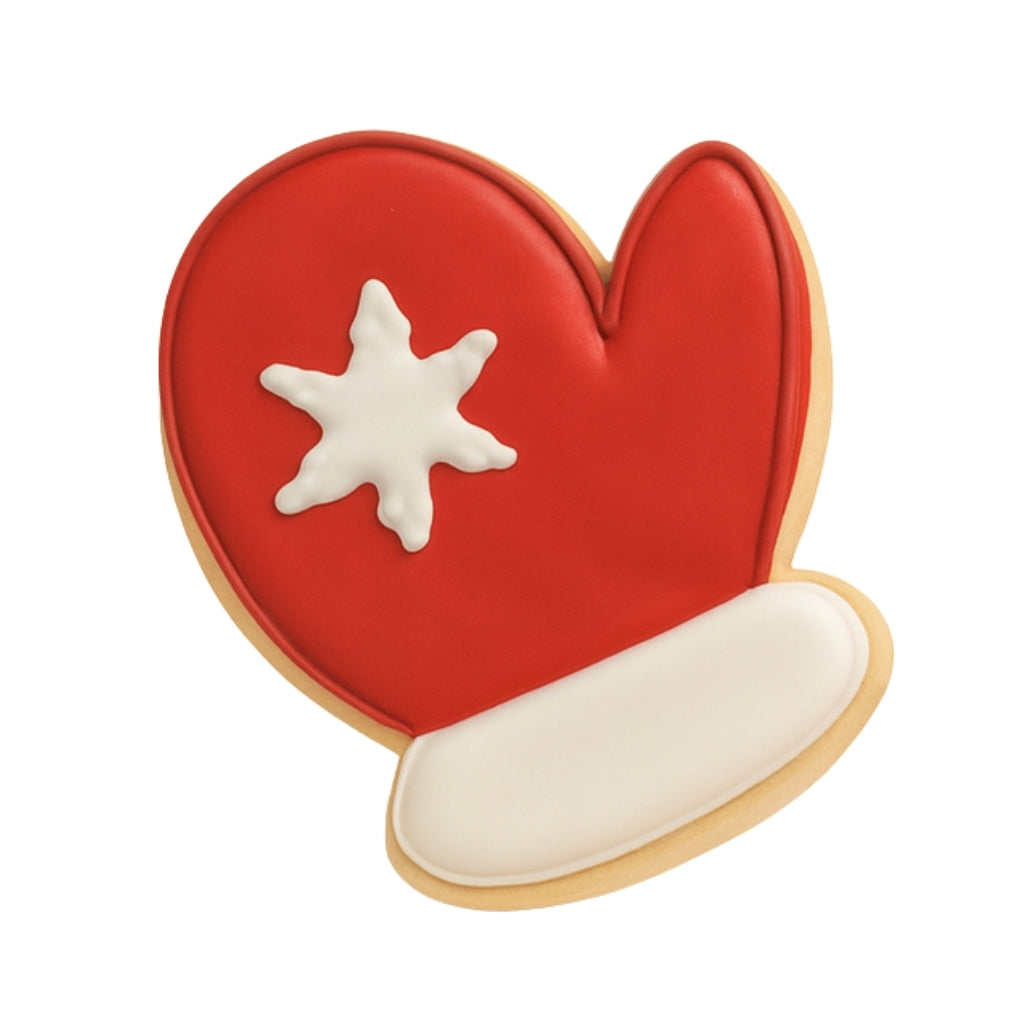 Christmas Couture mitten cookie with red icing and snowflake.