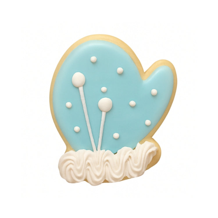 Christmas Couture mitten cookie with blue icing and white trim.