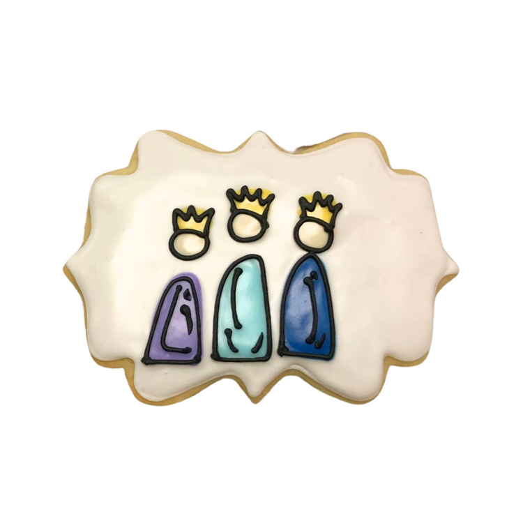 Christmas Characters cookie with three kings in colorful robes.