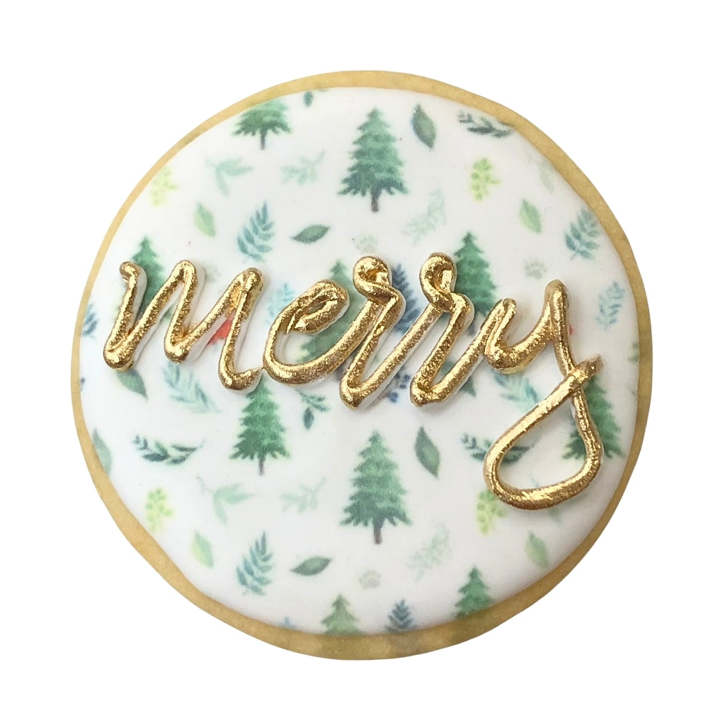 Holiday Greetings cookie with gold merry text and pine trees.