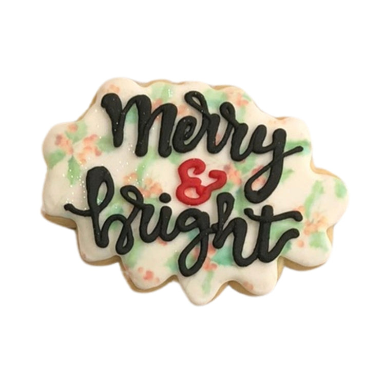 Holiday Greetings cookie with Merry and Bright icing design.