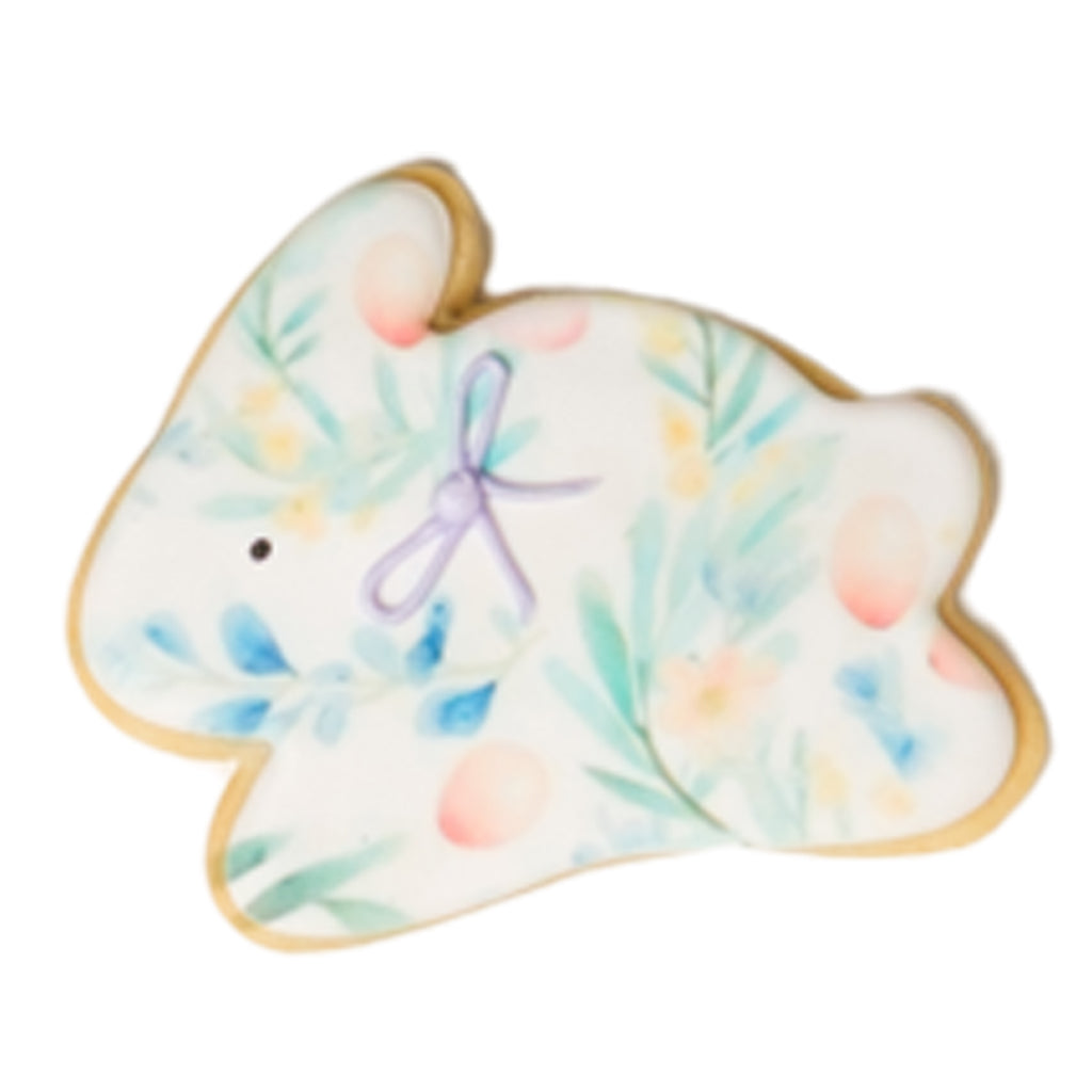 Easter butter cookie shaped like a bunny with floral icing.
