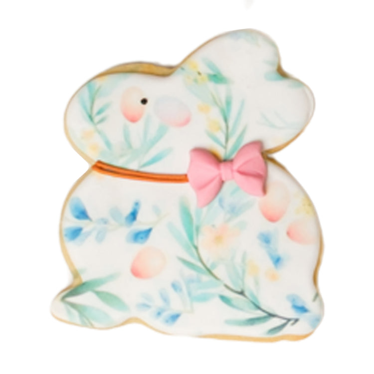 Easter butter cookie shaped like a bunny with floral icing.