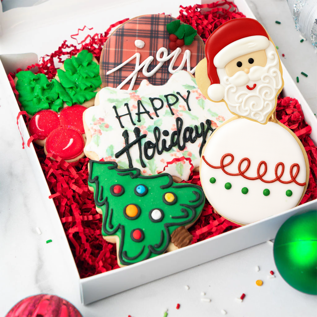 Gift box of Christmas butter cookies with festive icing designs.