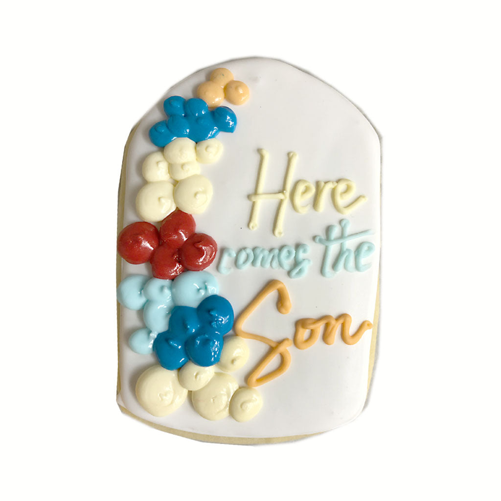 Here Comes the Son 2 cookie with blue and red balloon icing.