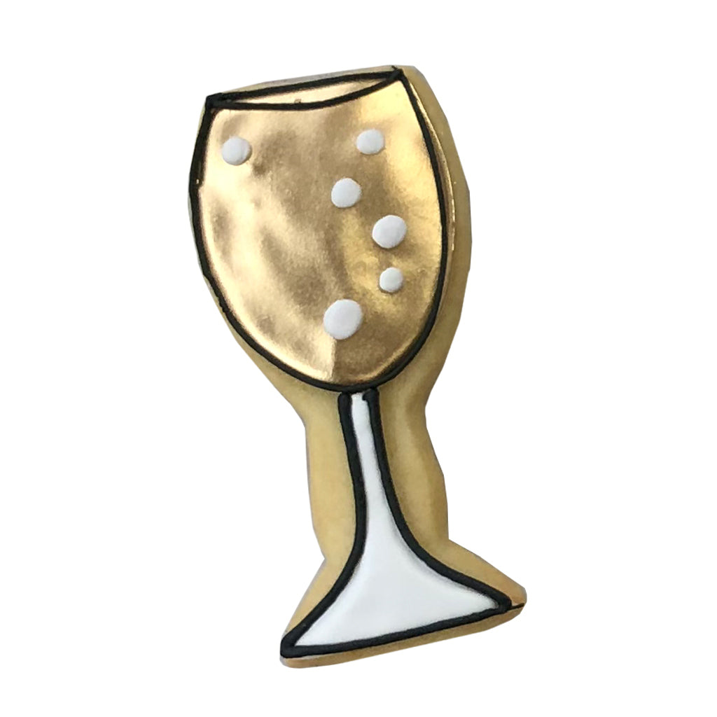 Champagne glass cookie with gold icing and white bubbles.
