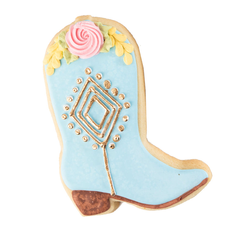 Cowboy Couture cookie shaped like a blue boot with gold details.