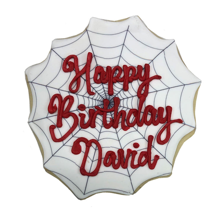 Spiderman cookie with red Happy Birthday David icing