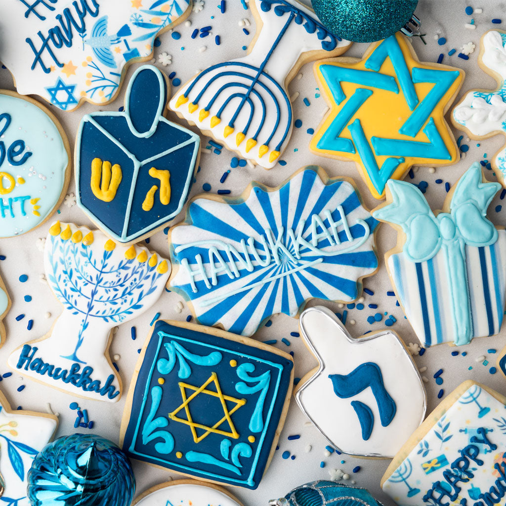 Assorted Hanukkah butter cookies with blue and yellow icing.