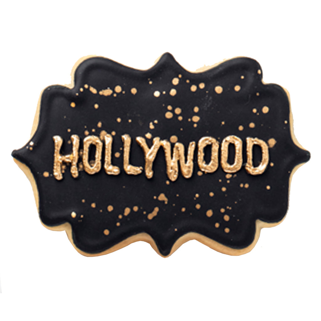 Academy Awards cookie with black icing and gold lettering.